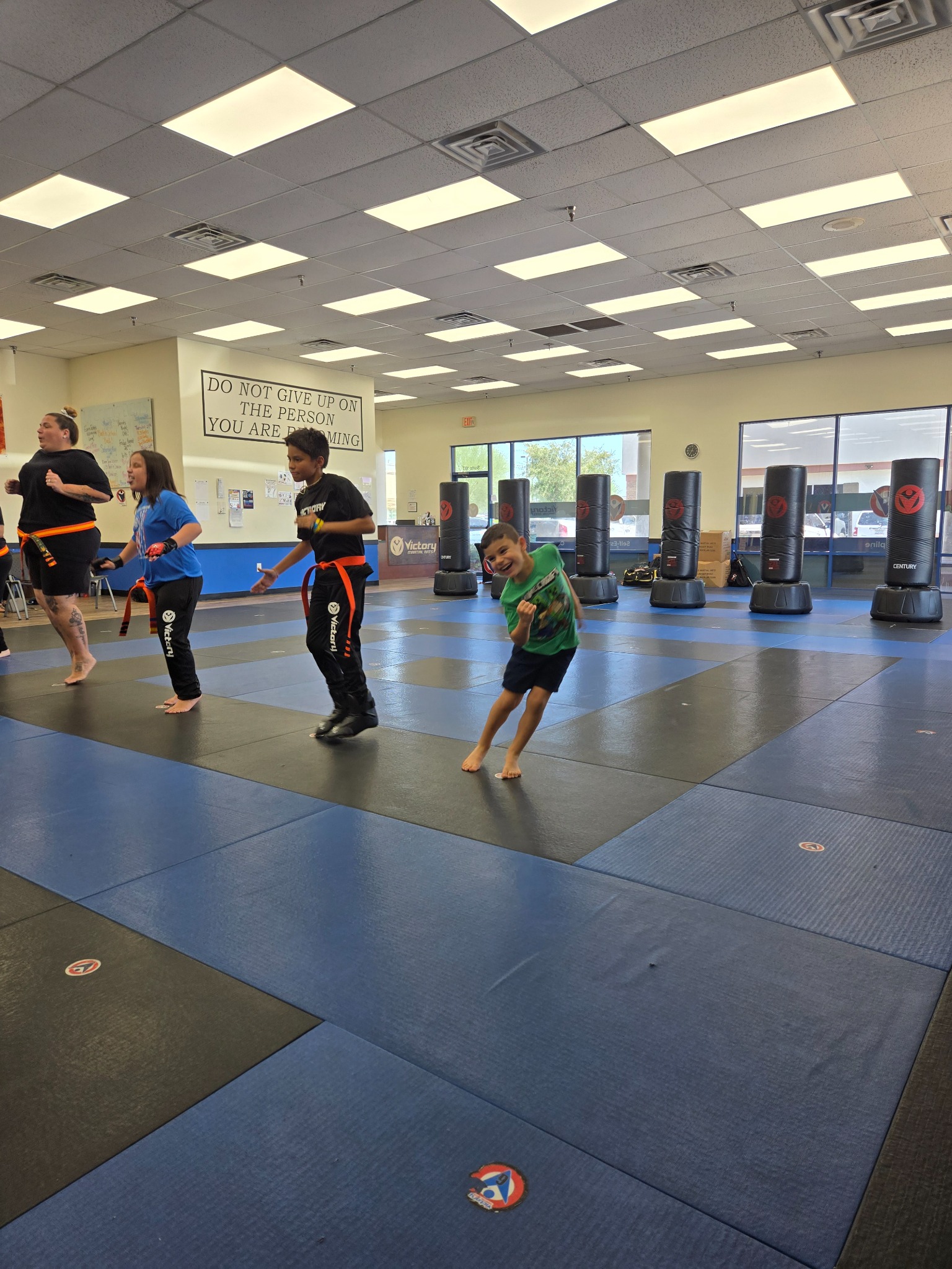 Heart Filled Academy students participating in a karate class with instructors